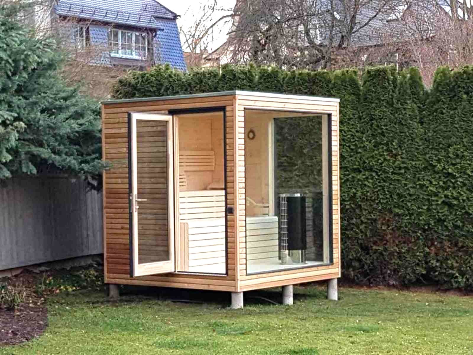 Mini Sauna für Garten kaufen mit Vorraum 2-4 Personen aus Holz klein Holzofen Design modern Deutschland Österreich Schweiz Polen Elektroofen Glasfront Panoramafenster Preis Kosten